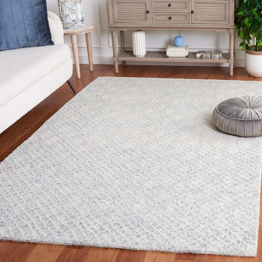SAFAVIEH, Handmade Ebony Juozapa Modern Wool Rug