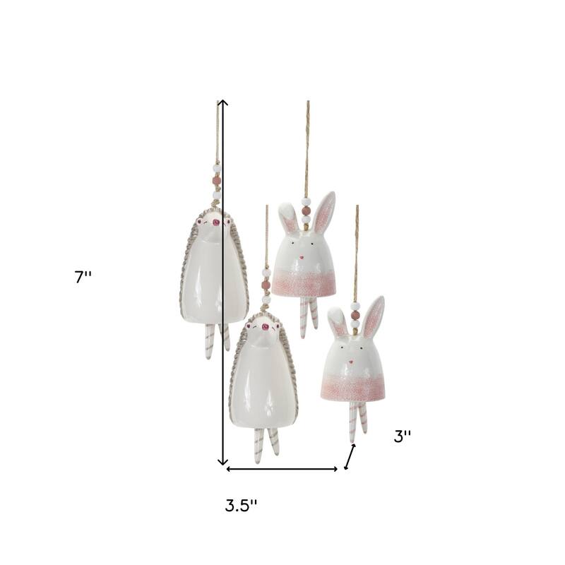 HomeRoots Set of Four 7" Pink And White Resin Hedgehog Model Bell Tabletop Sculpture - 3.5' X '7' X '3