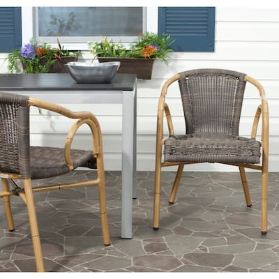 SAFAVIEH Outdoor Savana Woven Chocolate Arm Chair (Set of 2) - 21Wx24Dx34H