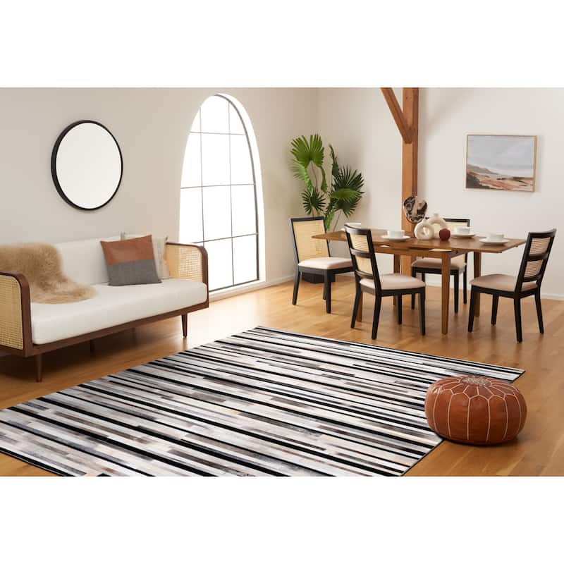 SAFAVIEH Handmade Studio Leather Syreeta Natural Hide Leather Rug