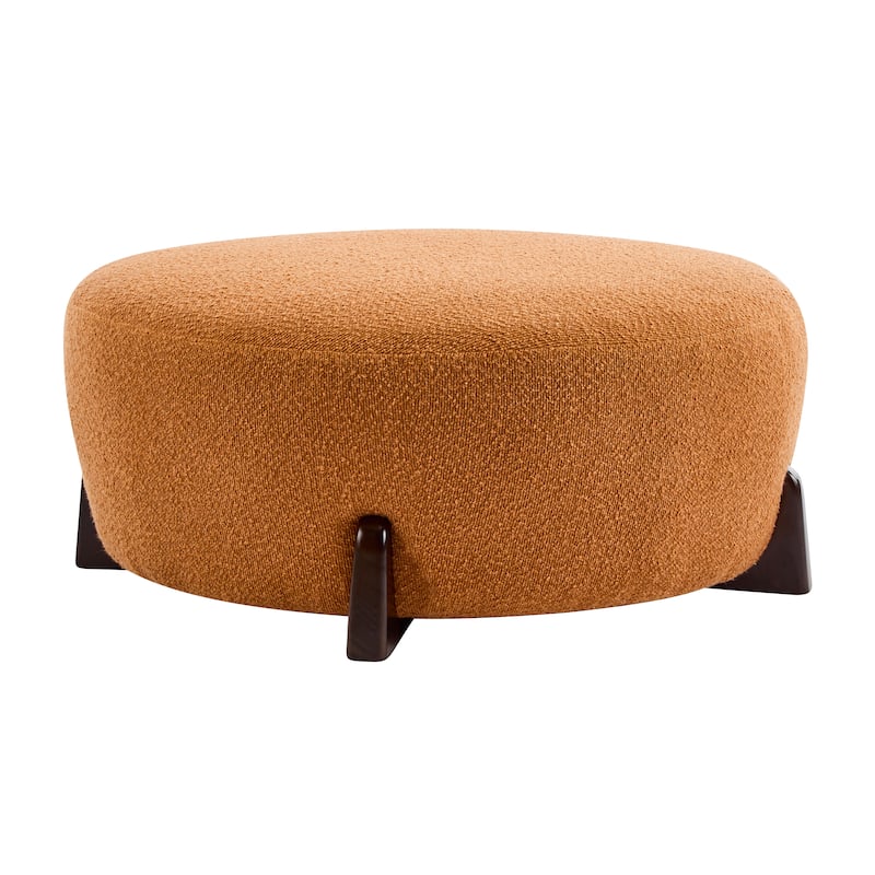 Modish Round Ottoman: Boucle Top with Splayed Rubber Wood Legs, Pumpkin Orange