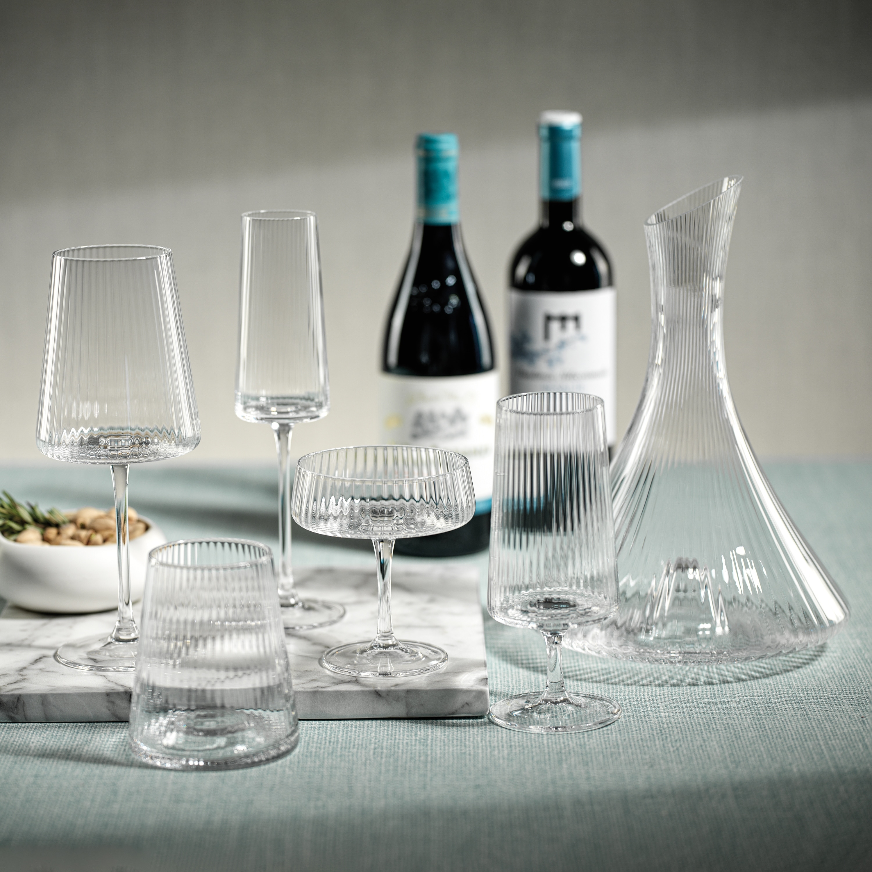 https://ak1.ostkcdn.com/images/products/is/images/direct/0155d432978ffe49ed2c4183d2e94485bf3fea30/Benin-Fluted-Textured-Wine-Glasses%2C-Set-of-4.jpg