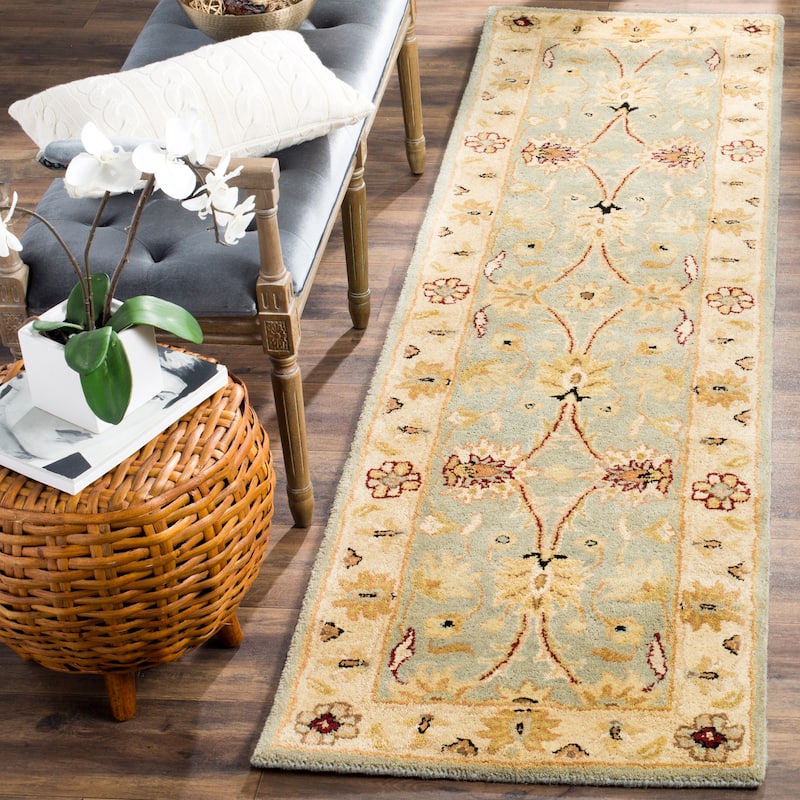 SAFAVIEH Handmade Antiquity Edie Traditional Oriental Wool Rug - 2'3" x 8' Runner - Light Blue/Ivory