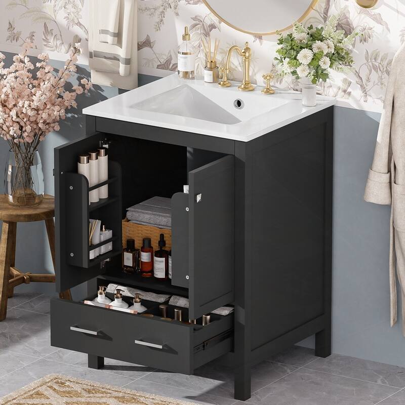 bathroom vanity with integrated undermount basin and a storage cabinet featuring 2 doors and 1 drawer
