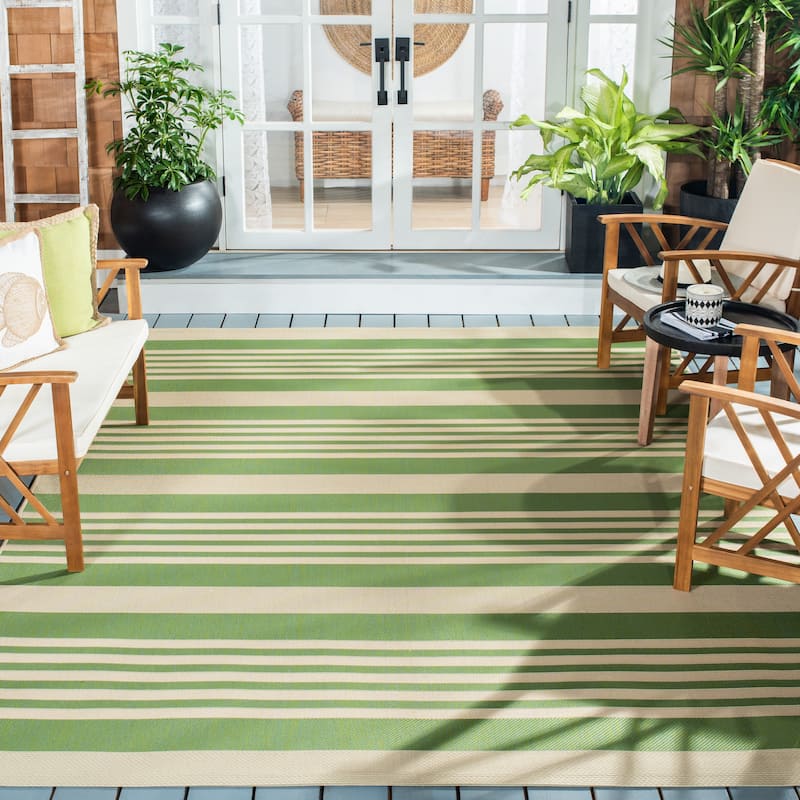 SAFAVIEH Courtyard Orsi Indoor/ Outdoor Waterproof Area Rug - 6'7" x 9'6" - Green/Beige