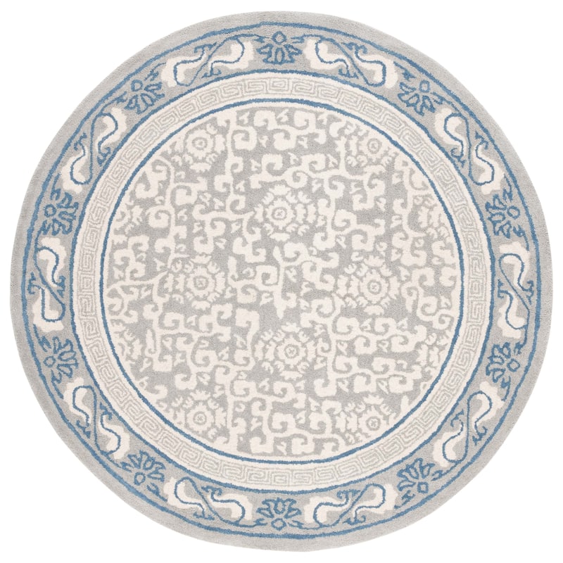 SAFAVIEH Handmade Antiquity Lauresha Wool Rug - 6' Round - Grey/Ivory