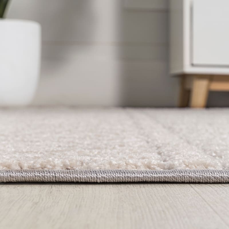 JONATHAN Y Duenas High-Low Two-Tone Monstera Leaf Area Rug