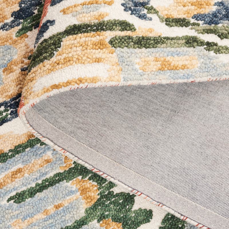 SAFAVIEH Handmade Ikat Katiuscia Bohemian Wool Rug