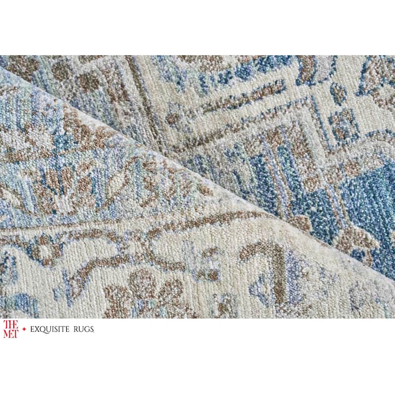 The Met X Exquisite Rugs Vintage Looms Blue/Beige Area Rug.