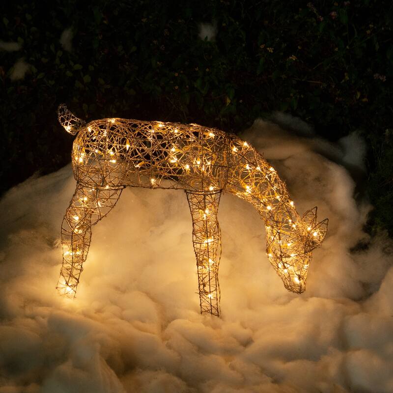 Alpine Corporation Outdoor Rattan Grazing Christmas Reindeer Lawn Decoration with White Halogen Lights - 29 in. - Brown
