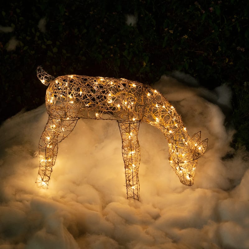 Alpine Corporation Outdoor Rattan Grazing Christmas Reindeer Lawn Decoration with White Halogen Lights - 29 in. - Brown