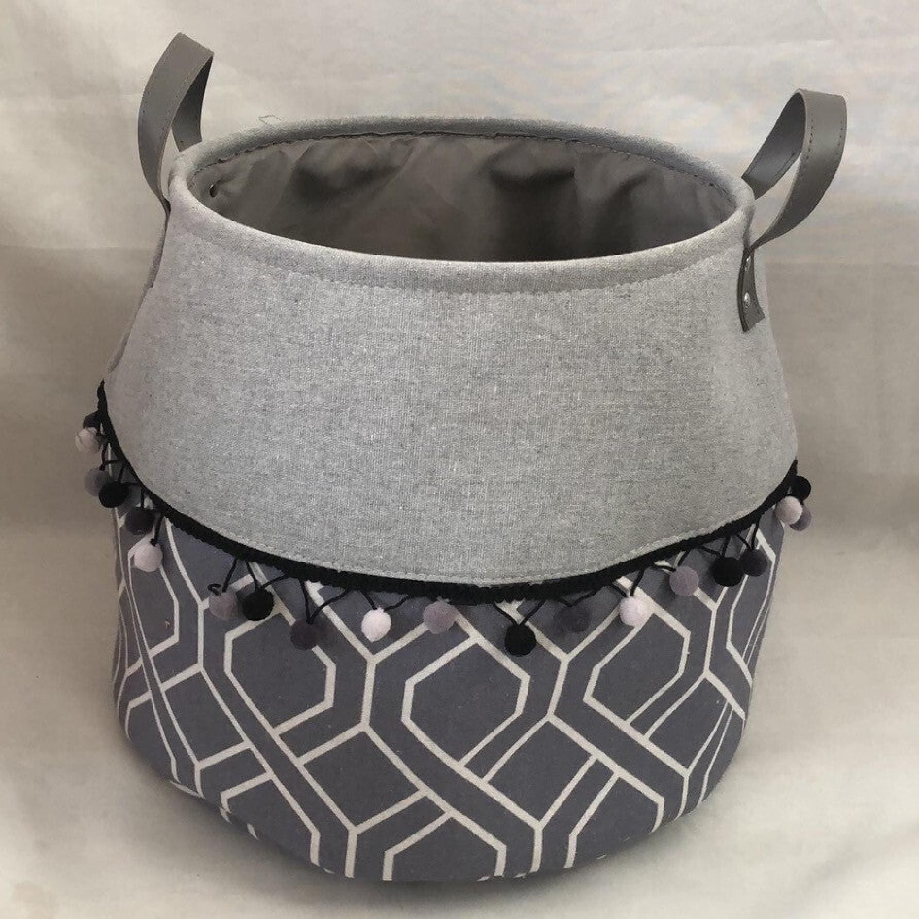 Gray And White Patterned Bottom With Gray Top Handled Fabric Basket
