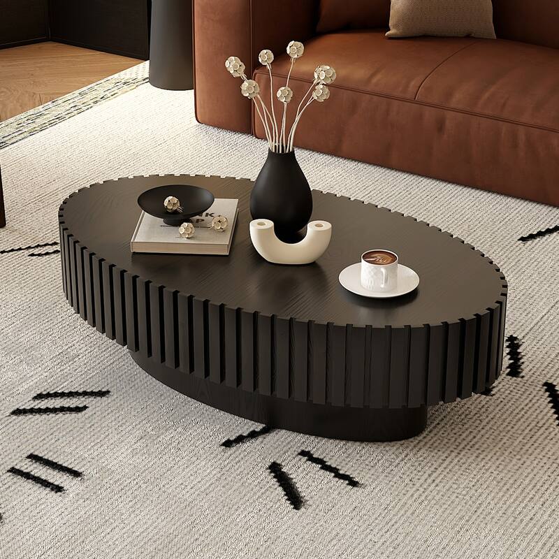 Handcrafted Relief Oval Coffee Table with Sturdy Pedestal - Black