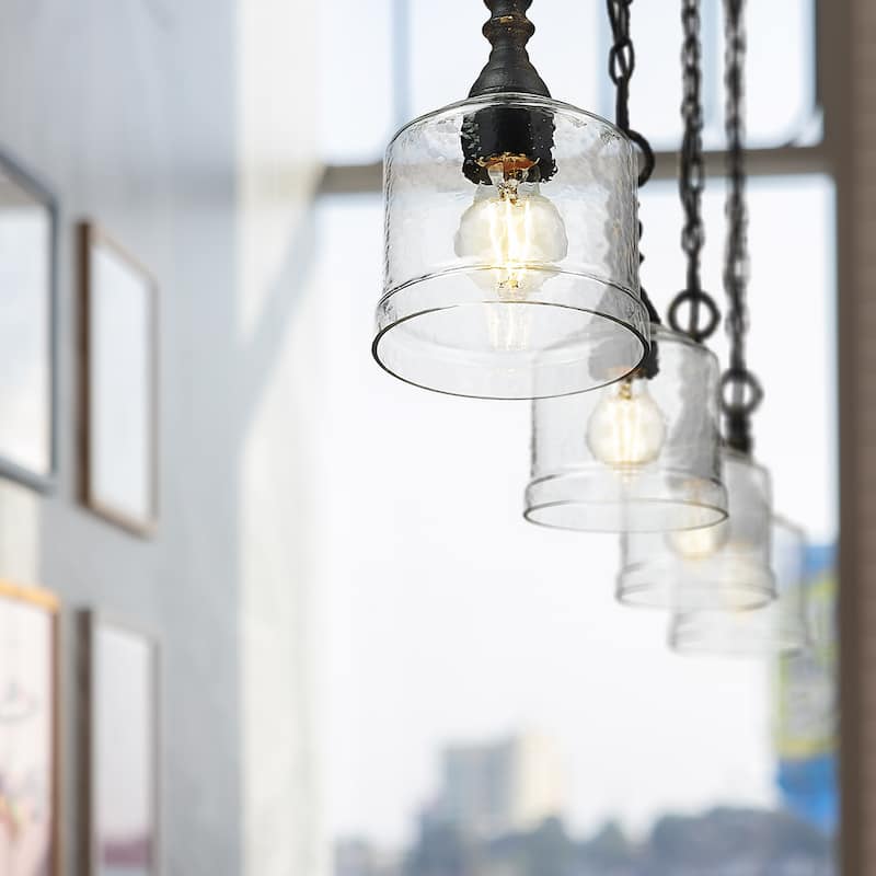 Golden Lighting Keating 1-light Pendant in Antique Black Iron and Hammered Water Glass - Gold