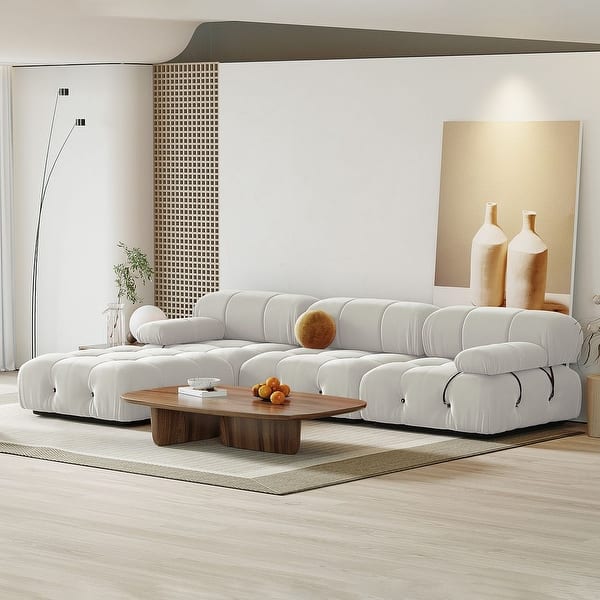 https://ak1.ostkcdn.com/images/products/is/images/direct/023142b6ffa6eb438dfc04b0bbf4630d939d10d1/Modern-4-seater-Velvet-Upholstered-Tufted-L-shape-Sectional-Sofa-with-Ottoman.jpg?impolicy=medium