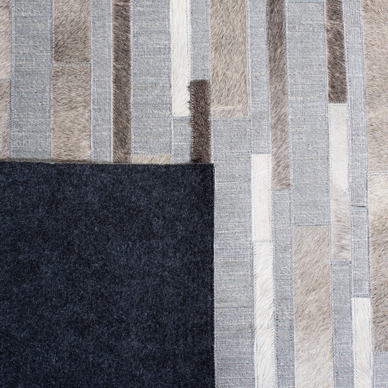 SAFAVIEH Handmade Studio Leather Kandice Modern Leather Rug