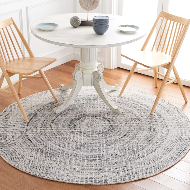 SAFAVIEH Handmade Abstract Maggy Modern Wool Rug - 6' Round - Black/Ivory
