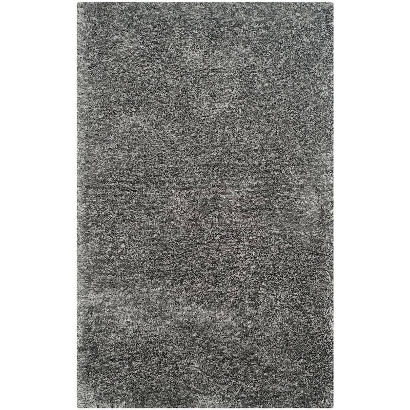 SAFAVIEH Handmade South Beach Leonella Shag Solid Polyester Rug