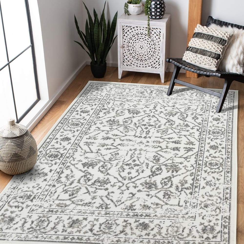 Alana Fany Bordered Area Rug