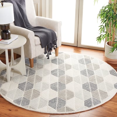 SAFAVIEH Handmade Ebony Sidonie Modern Wool Rug