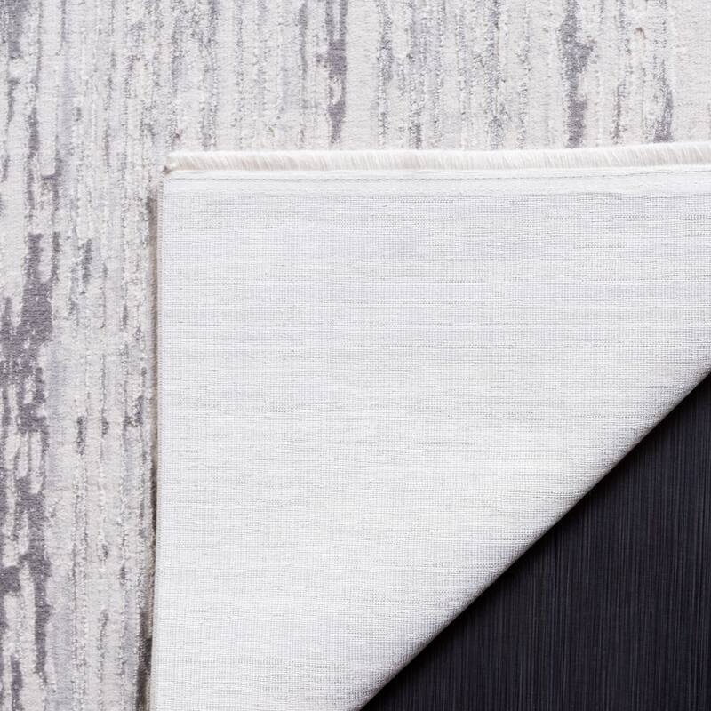 SAFAVIEH Diamond Einfrid Modern Abstract Fringe Rug