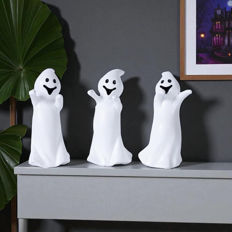 HomeRoots Set of Three White Polyresin Halloween Ghost Figurines - 3.05 in. x 6.35 in. x 3.30 in. - White - 3.05 in. x 6.35 in.  x 3.30 in.