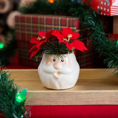 6" Poinsettias in Ceramic Santa Pot