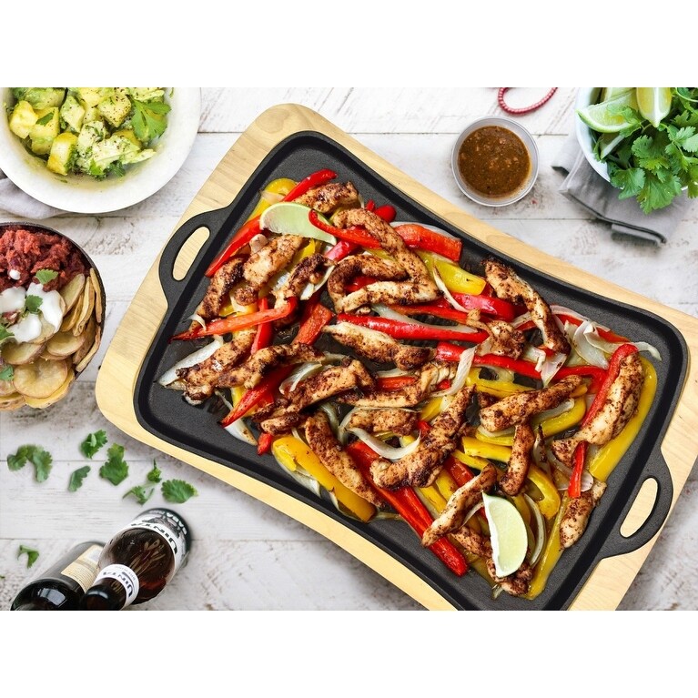 https://ak1.ostkcdn.com/images/products/is/images/direct/032819128eef5c78b3f6d5727f507e1afb2dca79/Jim-Beam-cast-iron-fajita-pan-with-wooden-trivet%2C-pre-seasoned-ideal-for-barbecuing-and-camping..jpg