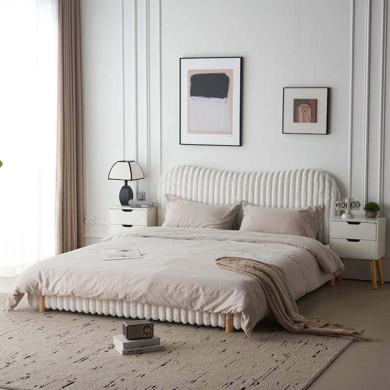 Sleek White Bouclé Upholstered Bed with Wavy Headboard & Vertical Stitching