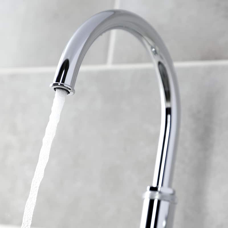 Kingston Brass Whitaker Single-Handle Deck Mount Kitchen Faucet with Brass Sprayer