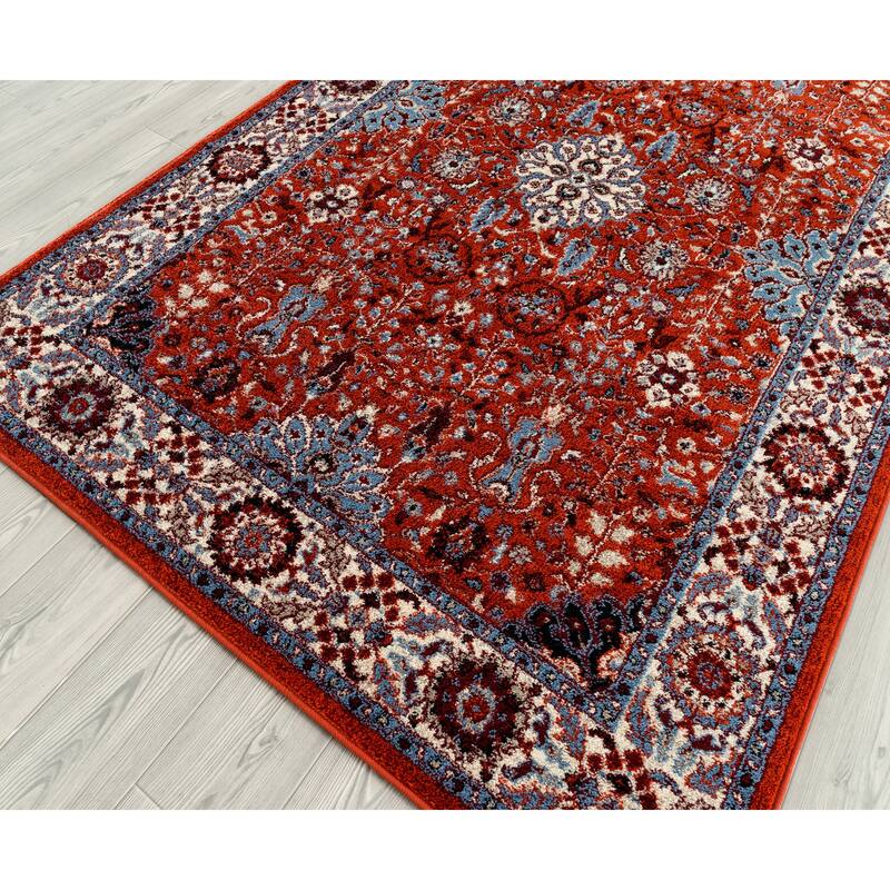 Santaria Sepha Vintage Bordered Area Rug