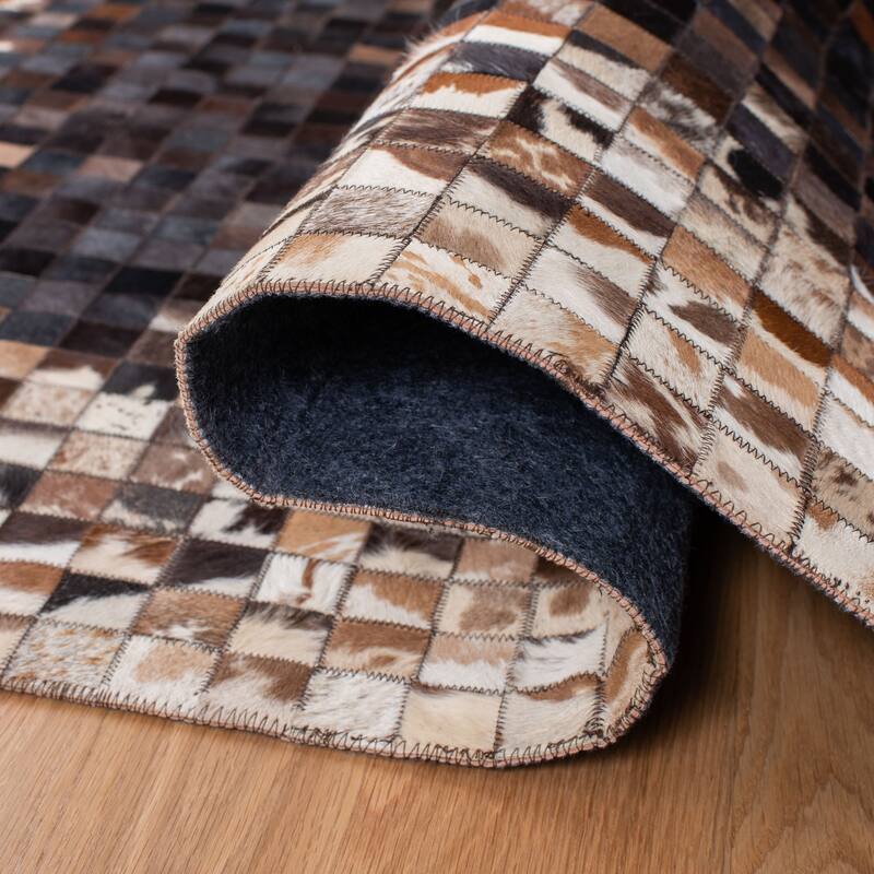 SAFAVIEH Handmade Studio Leather Tamisha Natural Hide Leather Rug