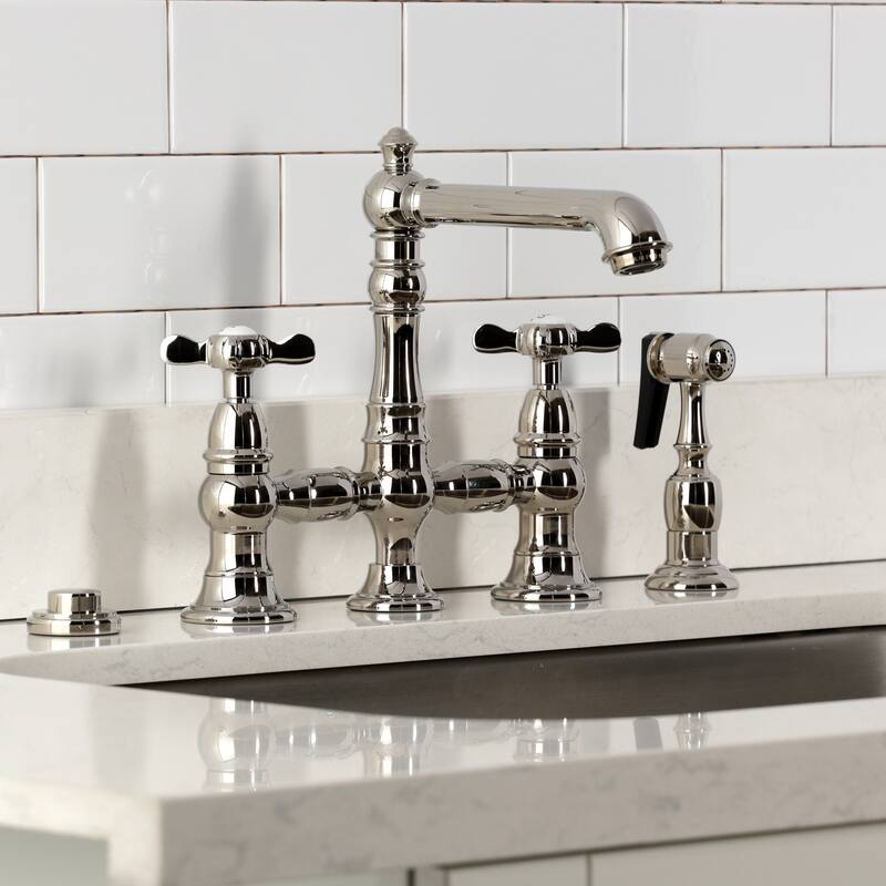 Kingston Brass Essex Two-Handle 4-Hole Deck Mount Bridge Kitchen Faucet with Brass Side Sprayer