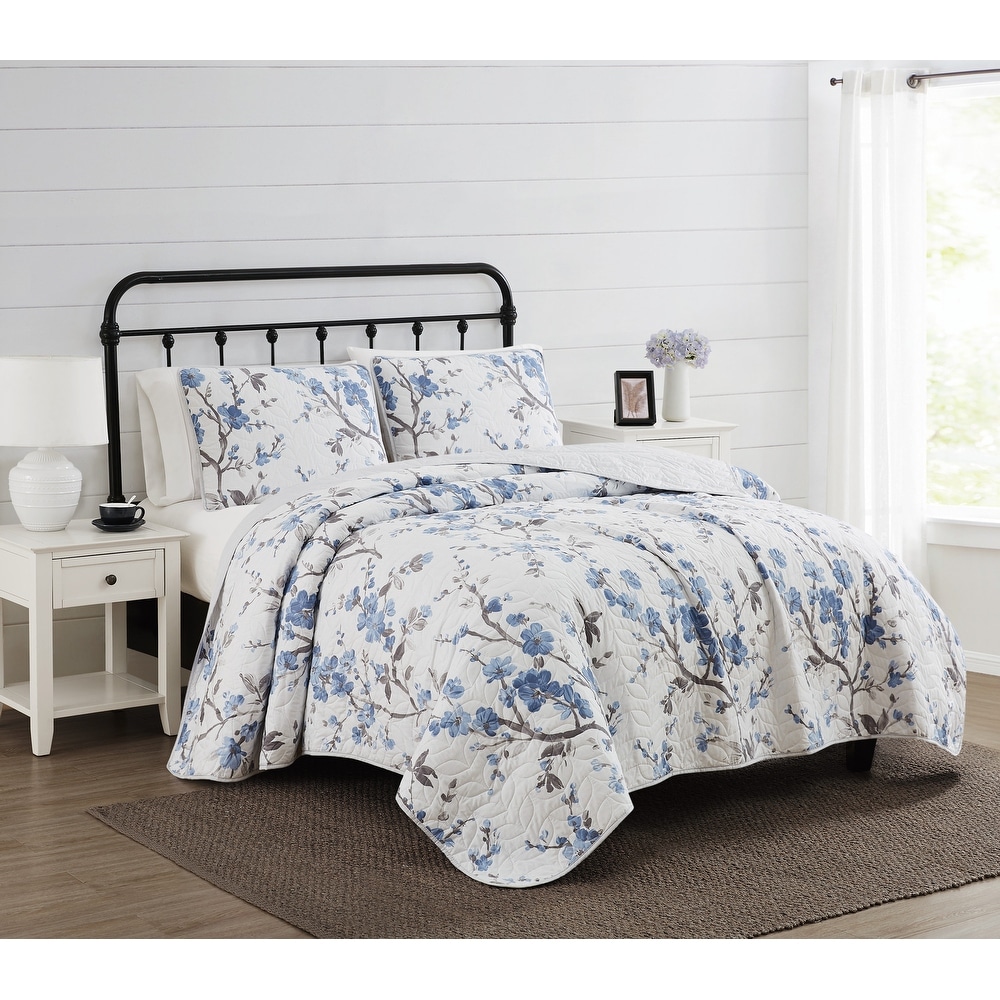 https://ak1.ostkcdn.com/images/products/is/images/direct/035f2cb4a76a0a9c4f9137541b3bafdfefab764a/Cannon-Kasumi-Floral-Quilt-Set.jpg