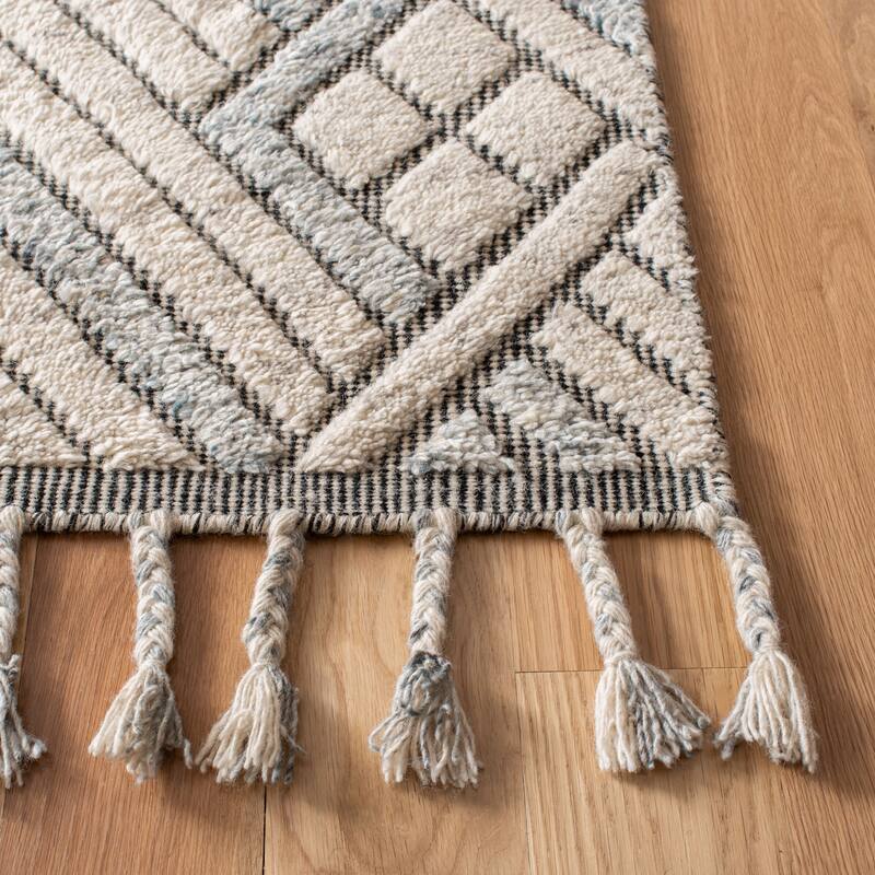 SAFAVIEH Hand-Knotted Casablanca Shag Aurane Tribal Wool Rug