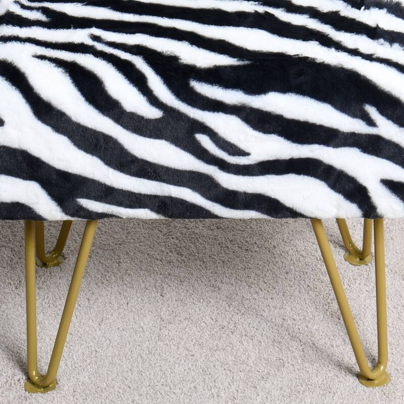 Home Soft Things Zebra Fauxfur Ottoman with Gold Metal Legs.
