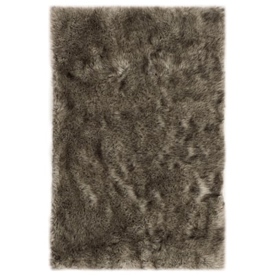 SAFAVIEH Faux Sheep Skin Carissa Shag Solid Rug