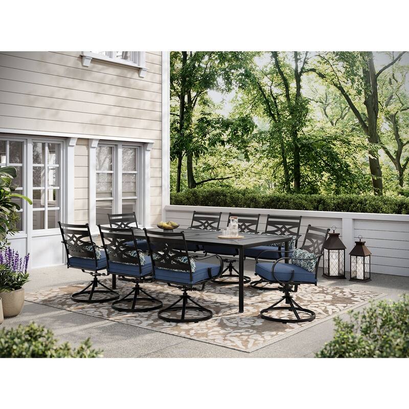 Hanover Montclair 9-Piece Dining Set in Navy Blue with 8 Swivel Rockers and a 42-In. x 84-In. Table
