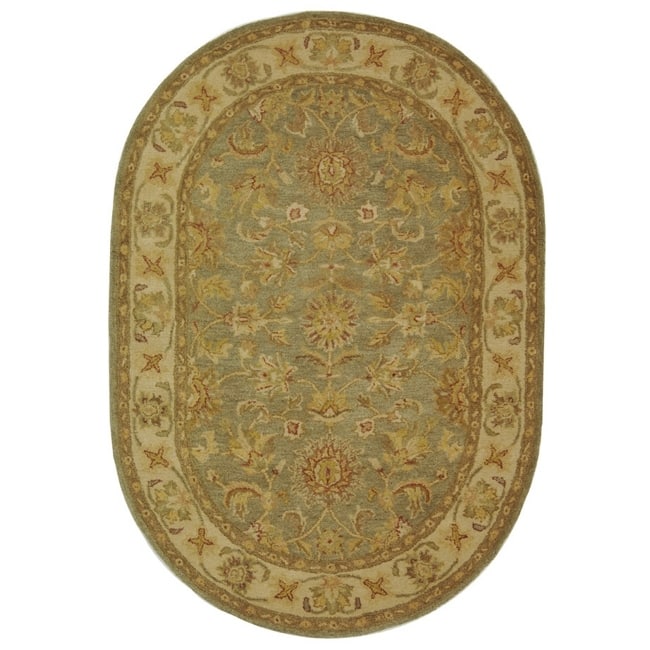 SAFAVIEH Handmade Antiquity Tiphanie Traditional Oriental Wool Rug - 4'6" x 6'6" Oval - Green/Gold
