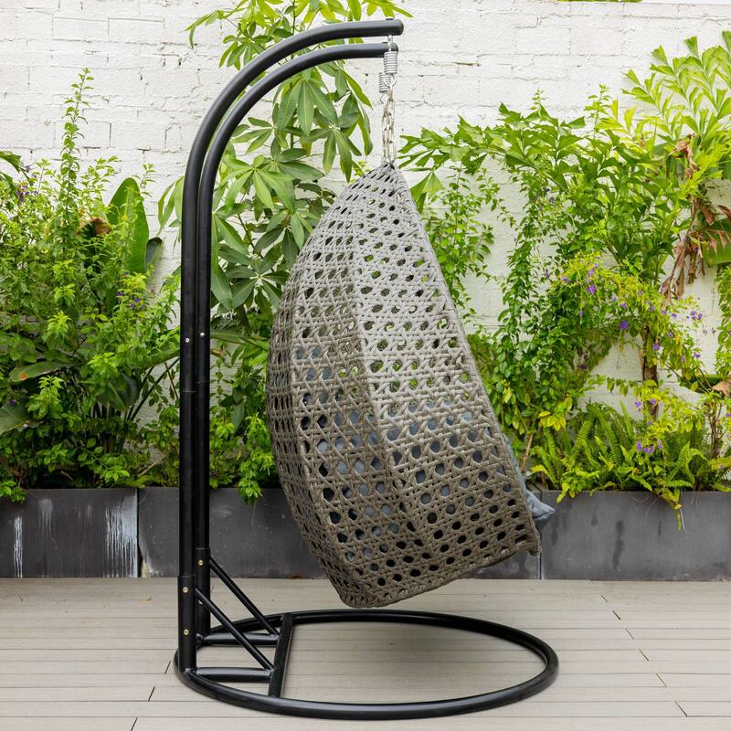 LeisureMod 2-Person Hanging Egg Swing Chair with Metal Stand - Handcrafted Charcoal Wicker, Patio Hammock Lounger with Cushions