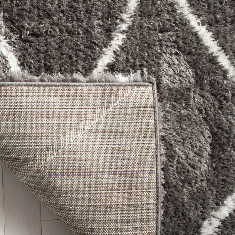 SAFAVIEH Handmade Flokati Dogg Shag Solid Polyester Rug