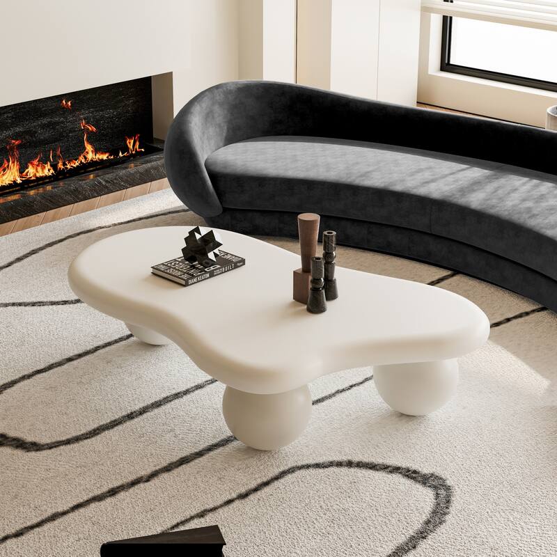 47 Inch Cloud Shaped Coffee Table with 3 Ball Legs for Living Room