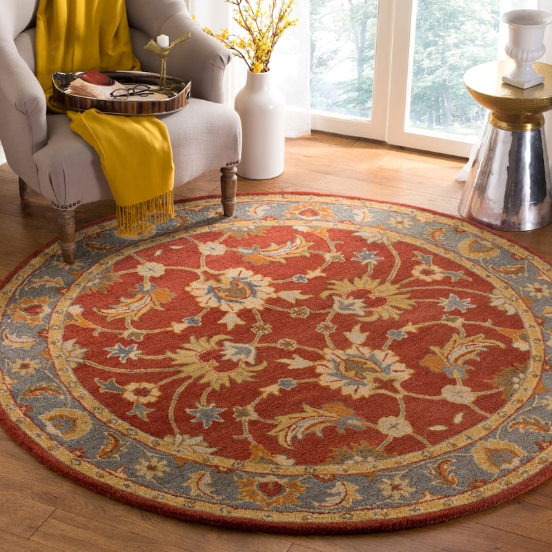 SAFAVIEH Handmade Heritage Tzippi Traditional Oriental Wool Rug - 6' Round - Red/Blue