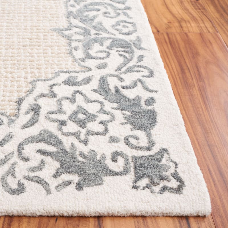 SAFAVIEH Handmade Ebony Snaedis Floral Wool Rug