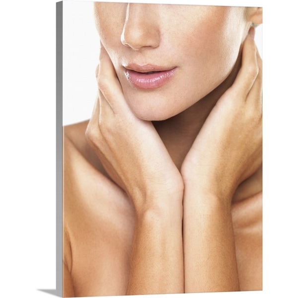 "Studio portrait of beautiful woman with hands over neck" Canvas Wall Art
