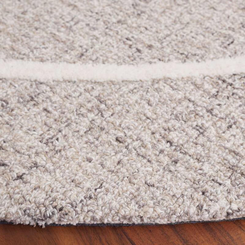 SAFAVIEH Handmade Ebony Steinvor Modern & Contemporary Wool Rug