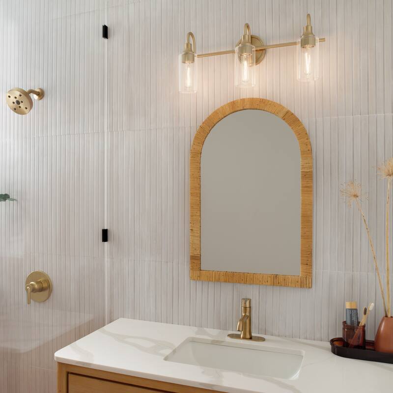 Kichler Lighting Kavi 23" 3-Light Vanity Light with Clear Glass in Champagne Bronze