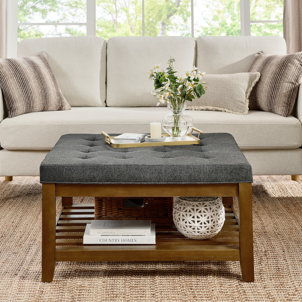 Coffee table with tufted linen upholstery