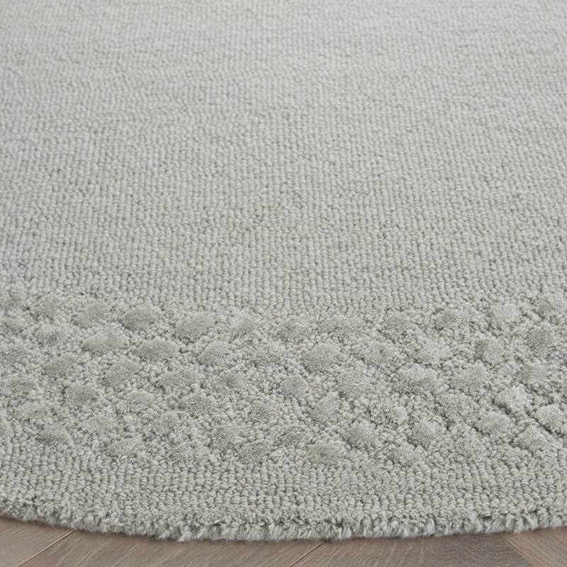 SAFAVIEH Handmade Glamour Printed Border Viscose Rug