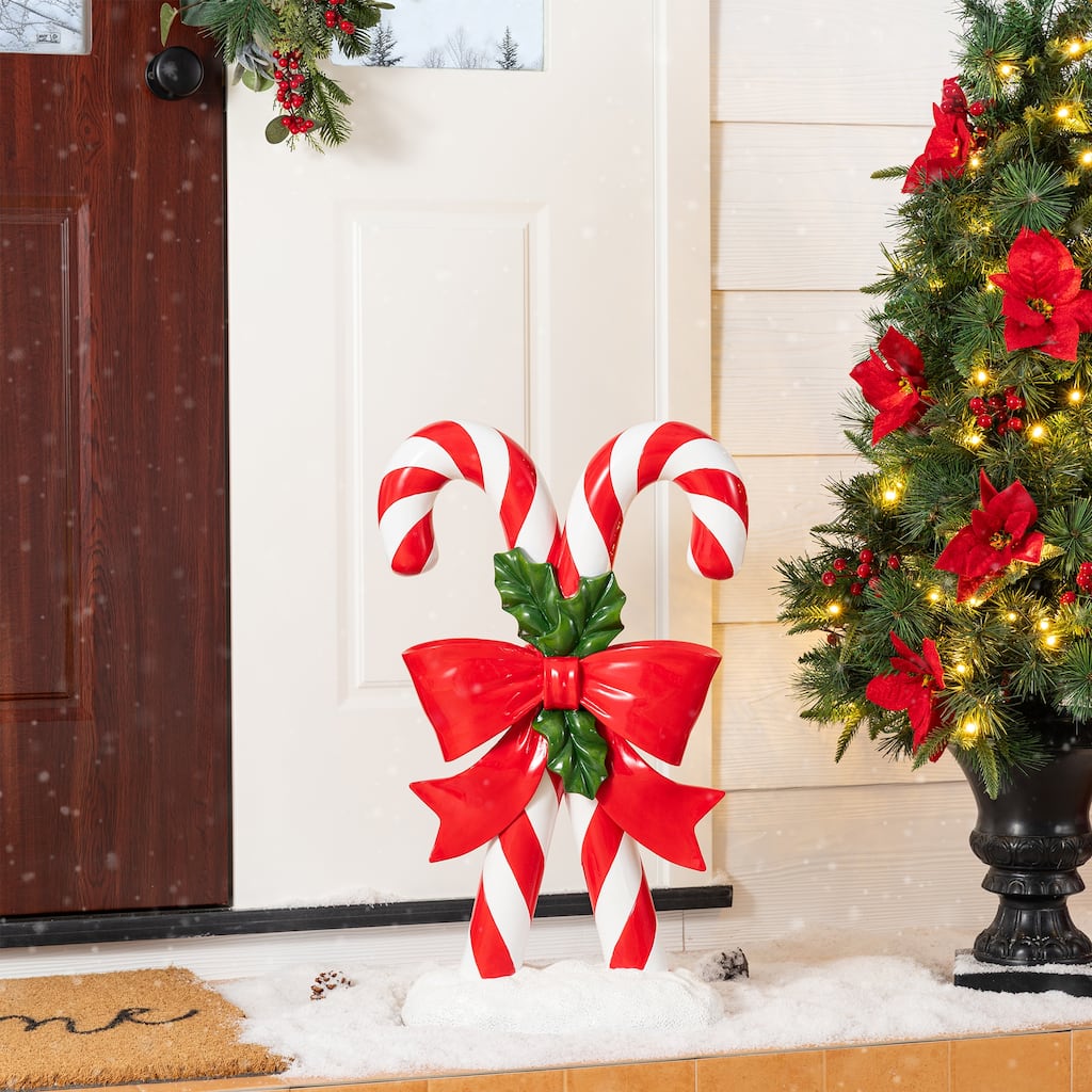 Glitzhome 24"H Christmas Polyresin Candy Cane Porch Decor